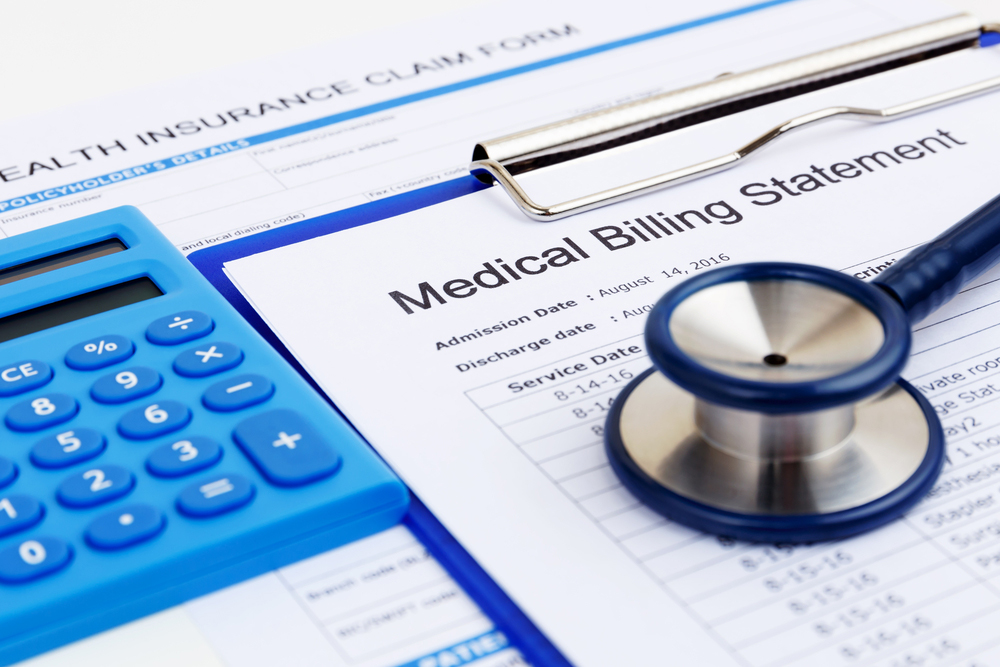 A medical billing statement with medical charges is on a blue clipboard with a stethoscope and blue calculator sitting nearby. Expert services page